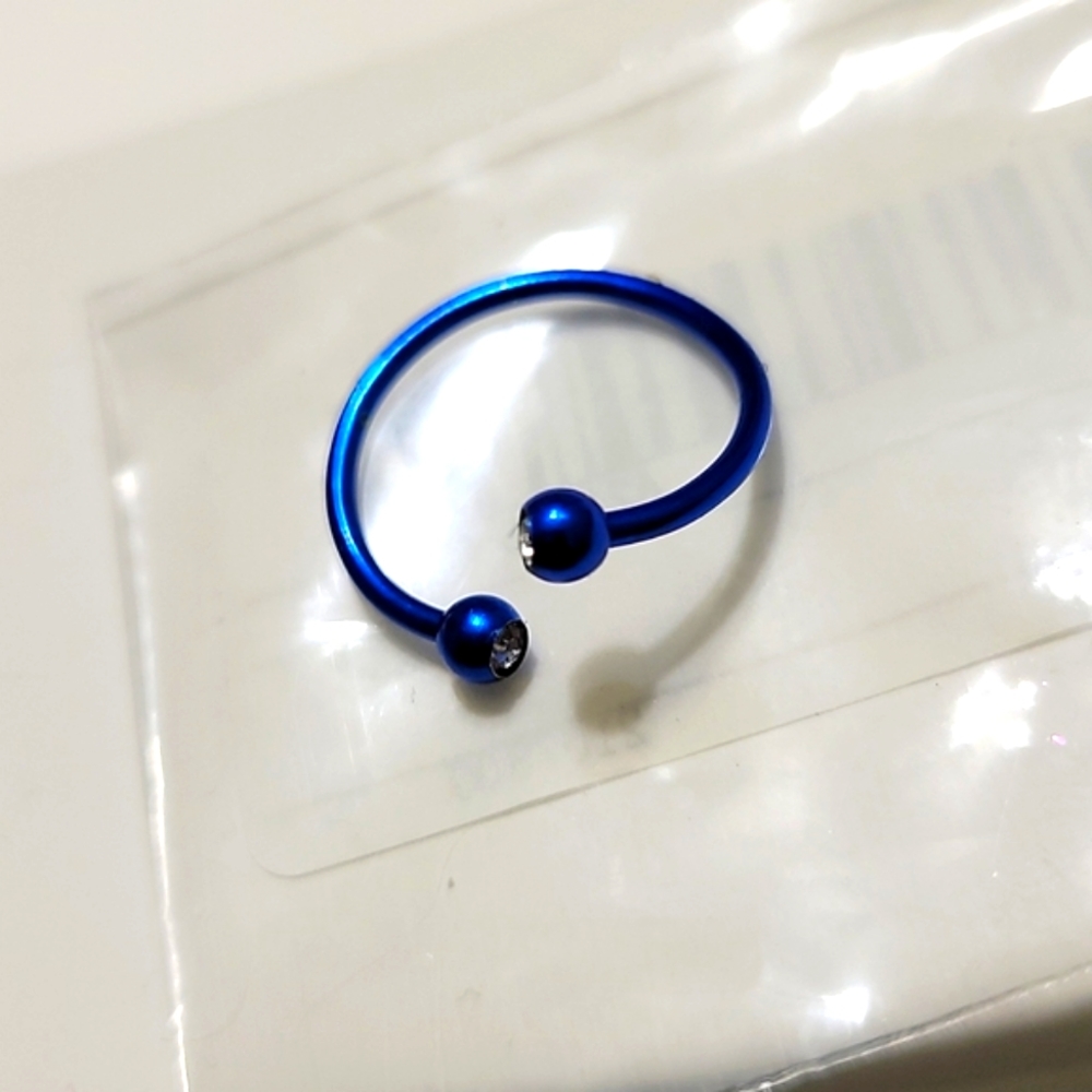 FREE 💙 Blue Spiral Horseshoe Piercing